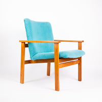Fauteuil Wroclaw turquoise côtelé