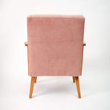 Fauteuil Rose Poudré en chute de tissu velours de la marque Hermès de dos 